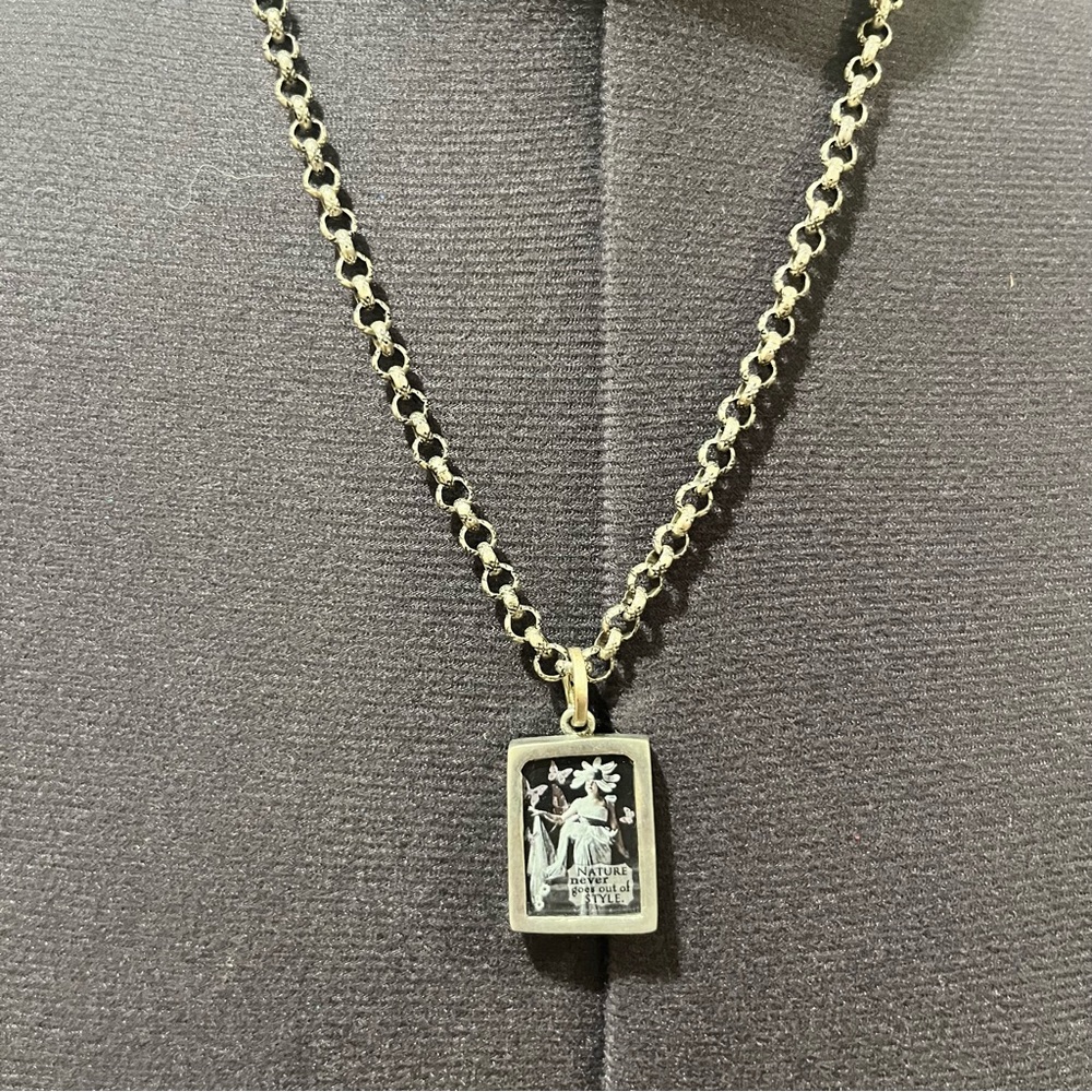 Whimsical Silver Pendant Necklace with Double Sided Images